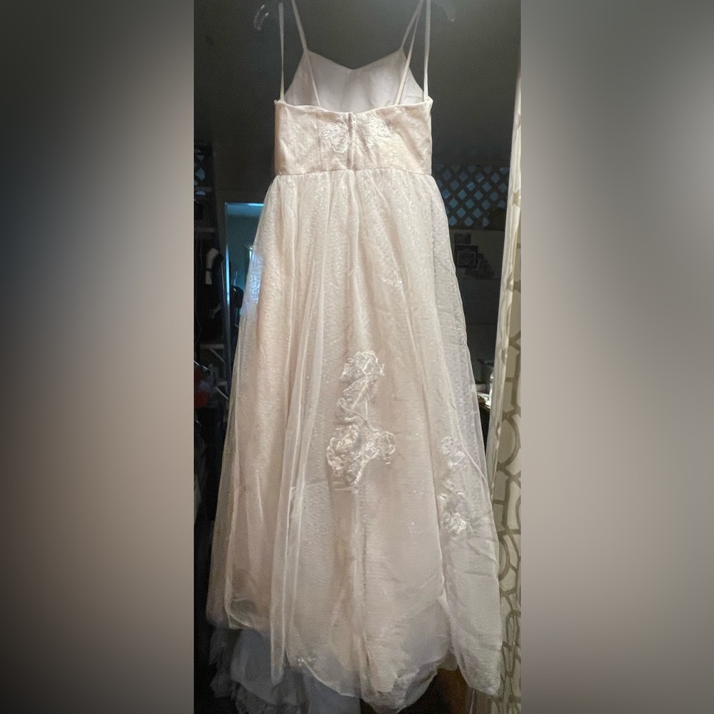 Selling brand with tags  new off- white Bridesmaid Gown. DB Studio. Size 12.